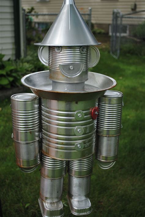 Tin Man Bird Feeder Made Out Of Soup Cans Pie Tin Sardine Cans And An Oil Funnel Tin Can