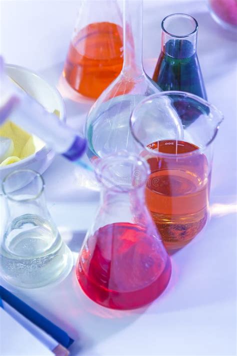 Bunch of Colorful Liquid Chemicals in Flasks Placed in Lab. Stock Image ...