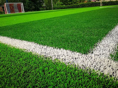 Astro Turf Football Field With Lush Green Pitch Photo Background And