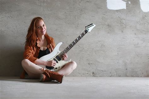 Young Red-haired Girl with an Electric Guitar. Rock Musician Gir Stock Image - Image of ...