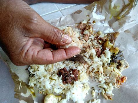 Eat Pork Rice By Hand Makan Nasi Babi Guling Khas Bali Stock Image