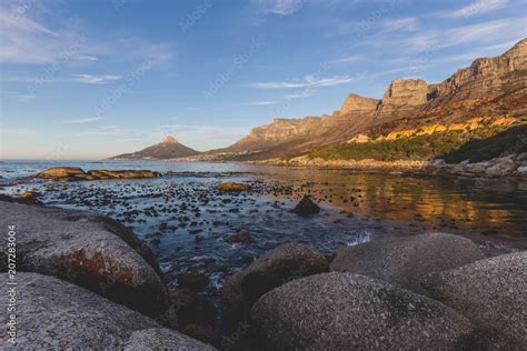 Sunset view of the 12 Apostles and Lion's Head in Cape Town over water Stock Photo | Adobe Stock