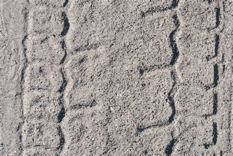 Premium Photo | The landscape of the road without asphalt sand tire tracks treads