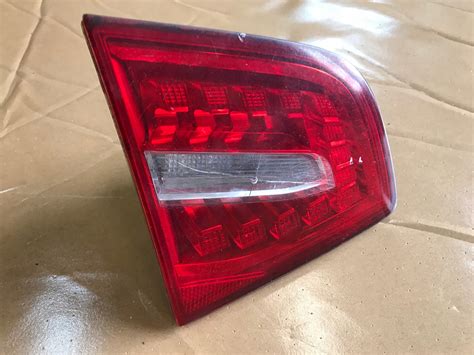 AUDI A6 C6 LIFT SEDAN LAMPA LEWA TYLNA W KLAPĘ za 129 zł z Marki