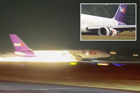 Fiery moment FedEx plane crash lands, skids off runway in Tennessee ...