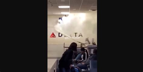 Woman Spraying A Fire Extinguisher On Airport Employees Arrested At