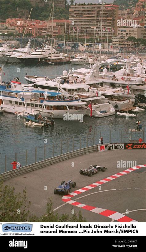 Formula One Motor Racing - Monaco Grand Prix - Practice. David Coulthard leads Giancarlo ...