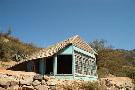 A Very Old Blue House Against a Blue Sky Stock Image - Image of village ...