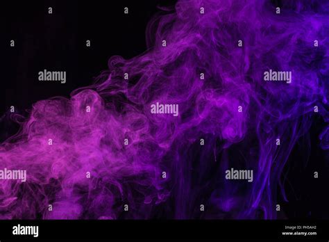 Mystical Purple Smoke On Black Background Stock Photo Alamy