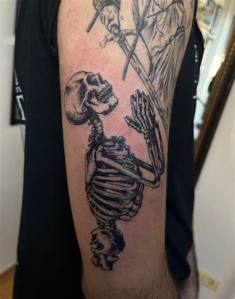 Praying Skeleton Tattoo Designs