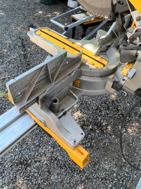 Lot 154 Dewalt Miter Saw And Stand Dwx723 Dws779 Gold Bar