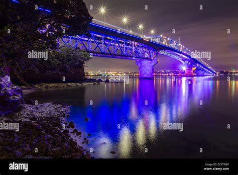 The Auckland Harbour Bridge, Auckland, New Zealand, colorfully lit up ...