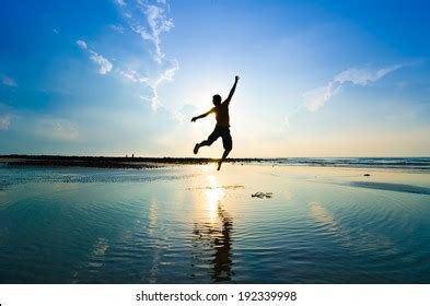 Silhouette Man Jumping Over Sun Rising Stock Photo 192339998 | Shutterstock