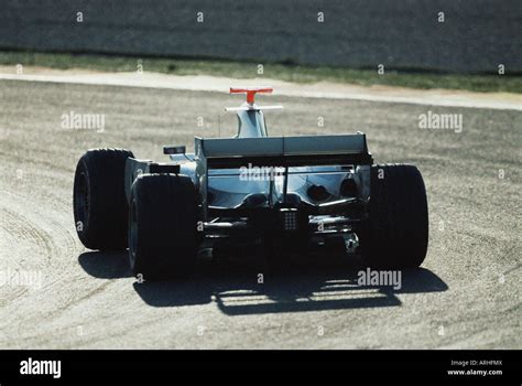 Formula Racecar Speeds Through Curve Jan Stock Photo Alamy