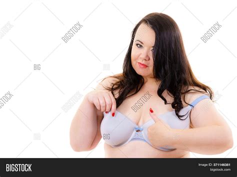 Plus Size Fat Mature Woman Wearing Bra On White Female Breast In