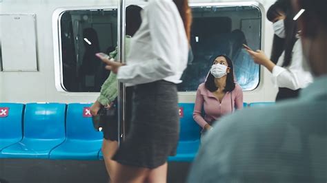 Premium Photo Pseople Wearing Face Masks On A Crowded Public Subway Train