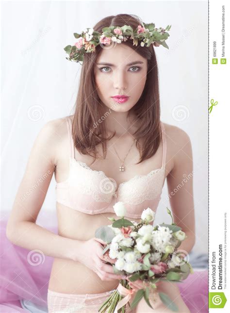 Woman With Black Hair In Lingerie Lying On The Bed Stock Image Image