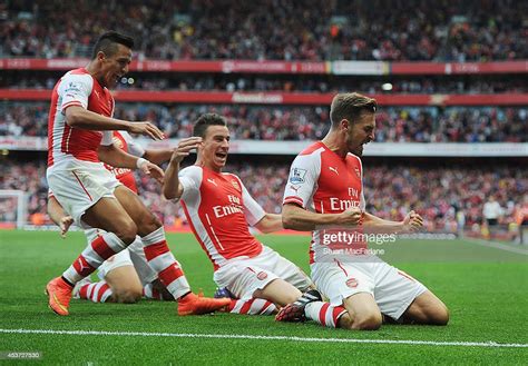 Aaron Ramsey Celebrates His Goal With Alexis Sanchez And Laurent