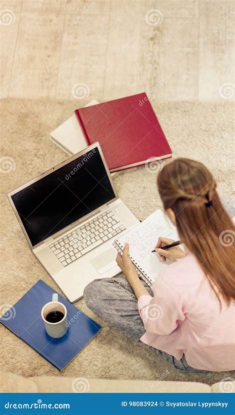 Young Student Learning at Home, Sitting on Carpet in Living Room. Stock Photo - Image of study ...