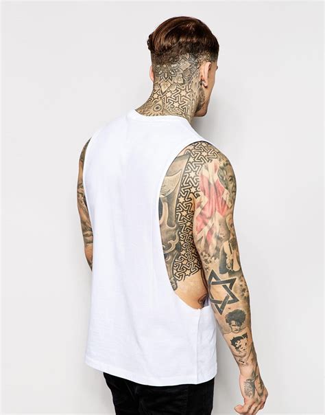 Lyst Asos Sleeveless T Shirt With Ripped Print And Extreme Dropped