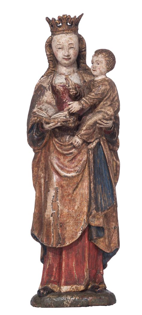 Lot A Polychrome Painted Walnut Standing Madonna Holding The Holy