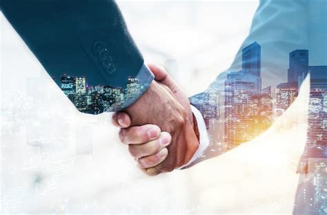 Premium Photo Welcome Double Exposure Of Business Man Partner Handshake