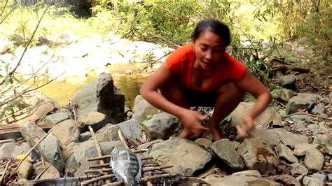 Survival Skills Finding Catch Fish By Hand In Water Catch And Cook