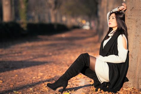 K Autumn Foliage Brunette Girl Sitting Legs Wearing Boots Bokeh