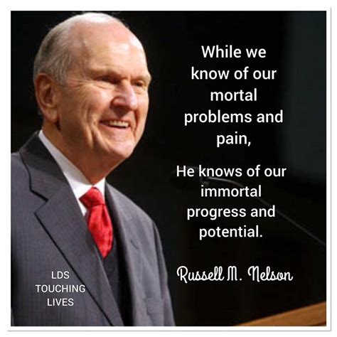 A Man In A Suit And Tie Standing At A Podium With A Quote From Russell