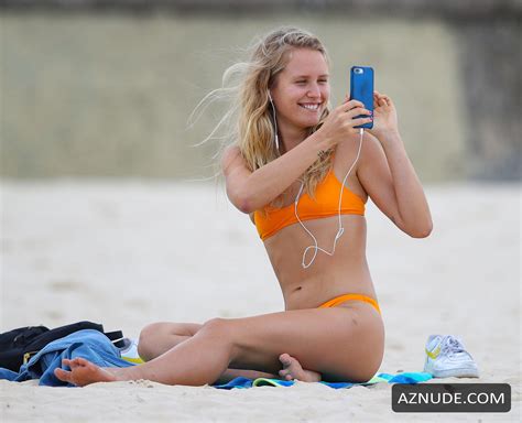Sailor Brinkley Sunbathing In Her Bright Orange Bikini At Bondi Beach