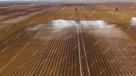 Premium Photo | Irrigation system on agricultural land