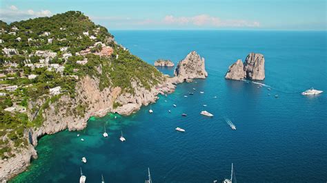 Capri Coastline Shines With Mediterranean Nature Under The Summer Sun