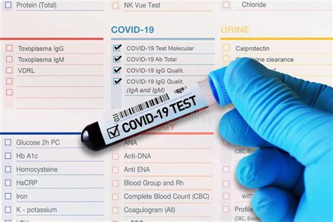 Blood Tube Test With Requisition Form For Covid Testing Stock Photo