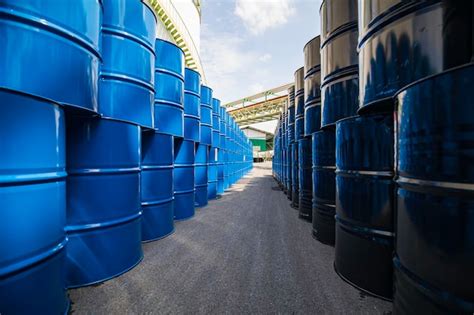 Premium Photo Oil Barrels Blue Or Chemical Drums Vertical