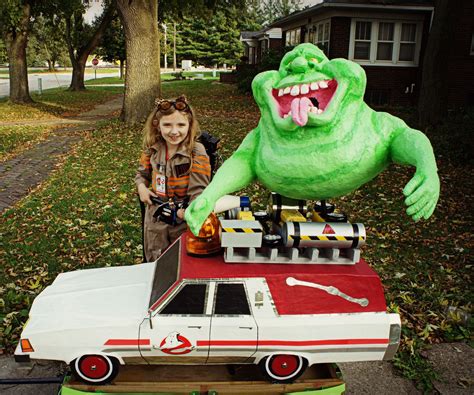 Awesome Ghostbuster With Proton Pack, Slimer, Ecto-1, and Ghost-Trap ...