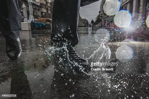 5,618 Puddle Splash Stock Photos, High-Res Pictures, and Images - Getty Images