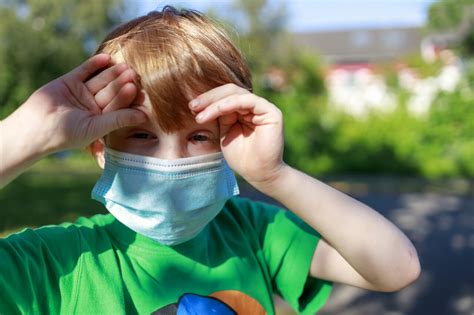 young boy with a mask - protection against covid-19 coronavirus - Photo ...