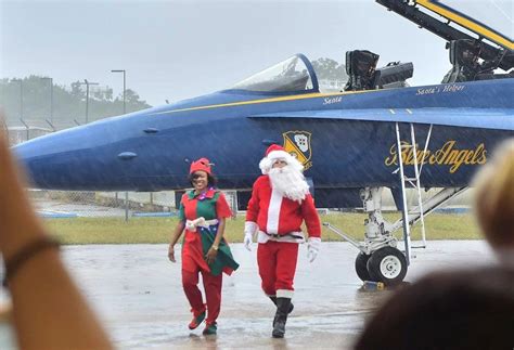 Santa Claus Delivers Holiday Cheer to America's Military Bases