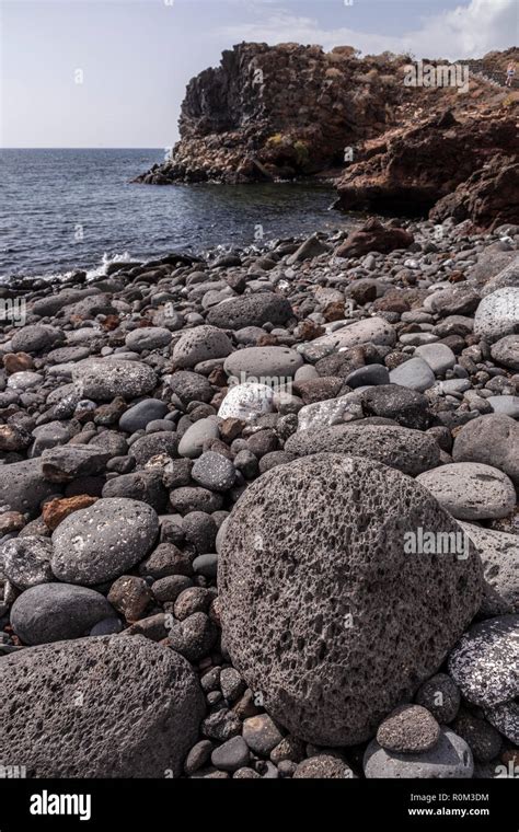 Volcanic pumice rocks on the Atlantic shore of Tenerife at Amarilla in the Canary Islands Stock ...