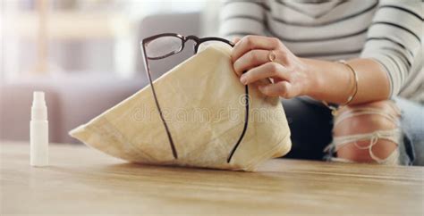 Hand Woman Cleaning Glasses And Spray With Chemical Liquid Cloth And Hygiene With Lens