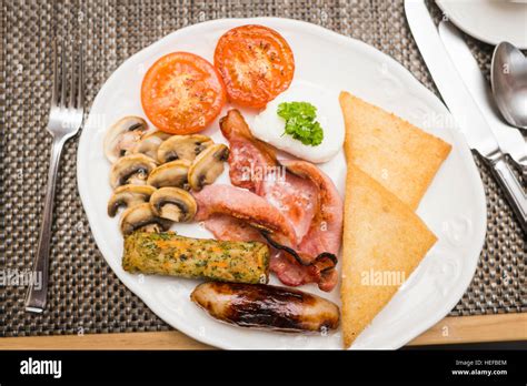 full monty  fried full english breakfast   white plate