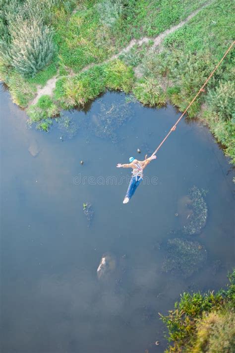 Extreme Jump from the Bridge. the Man Jumps Surprisingly Quickly in ...