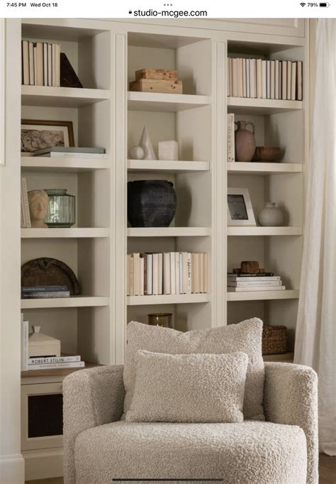 Cozy Living Room with White Bookshelves