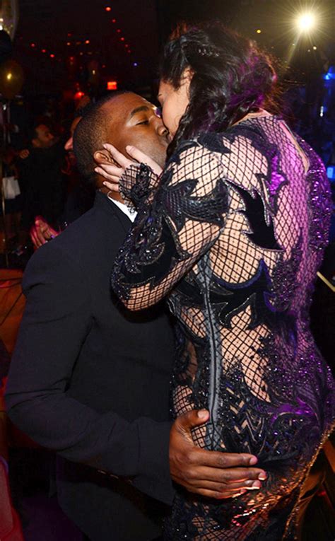 Pregnant Kim Kardashian Gives Kanye West A Big Kiss On New Years Eve