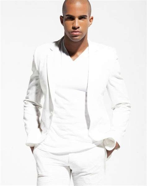 A Gentlemen In All White Attire By All Whie Party