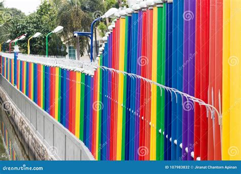 Rainbow Color Fence With Concrete Wall Stock Photo Image Of Blurry