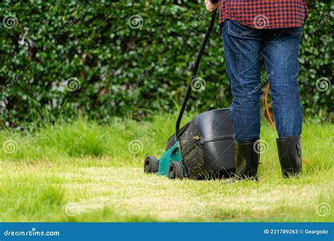 Worker Using A Lawn Mower Cutting Grass Stock Image Image Of Cutter Cutting 221789263