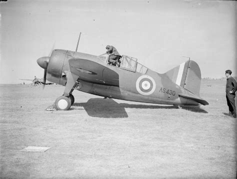 [Photo] A British pilot entering the cockpit of a Buffalo fighter, date ...