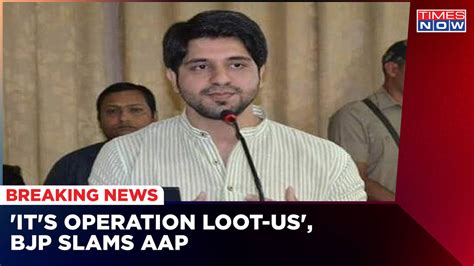 War Of Words Over Liquor Scam Continues In Delhi Bjp Leader Shehzad Poonawalla Slams Aap