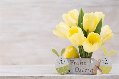 Premium Photo Yellow Tulips Spring Flowers And Easter Decoration